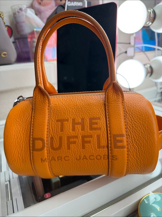 Marc Jacobs Handbags - Marc Jacobs Mini Duffle Bag in Bright Orange Pebbled Leather